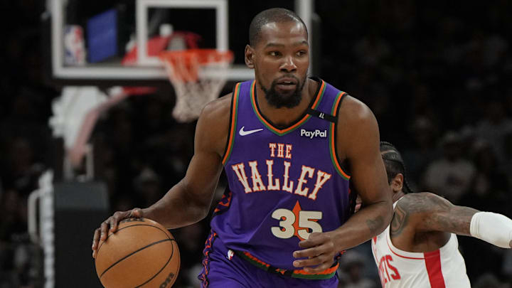 Mar 30, 2025; Phoenix, Arizona, USA; Phoenix Suns forward Kevin Durant (35) drives against the Houston Rockets in the first half at Footprint Center. Mandatory Credit: Rick Scuteri-Imagn Images