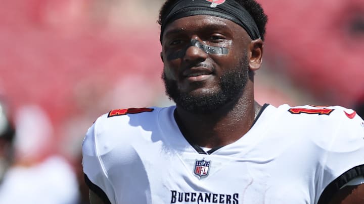 Sep 22, 2024; Tampa, Florida, USA;  Tampa Bay Buccaneers wide receiver Chris Godwin (14) works out prior to the game against the Denver Broncos at Raymond James Stadium. Mandatory Credit: Kim Klement Neitzel-Imagn Images