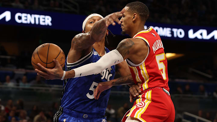 Jan 7, 2024; Orlando, Florida, USA; Atlanta Hawks guard Dejounte Murray (5) drives to the basket