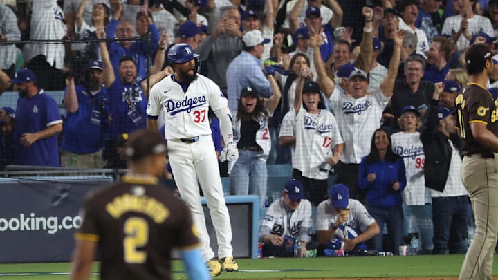 Oct 11, 2024; Los Angeles, California, USA; Los Angeles Dodgers outfielder Teoscar Hernandez (37) celebrates after hitting a solo home run in the seventh inning against the San Diego Padres during game five of the NLDS for the 2024 MLB Playoffs at Dodger Stadium. Mandatory Credit: Kiyoshi Mio-Imagn Images