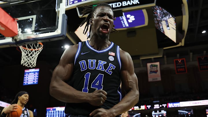 Feb 17, 2025; Charlottesville, Virginia, USA; Duke Blue Devils guard Sion James (14) reacts after scoring while being fouled against the Virginia Cavaliers in the first half at John Paul Jones Arena. Mandatory Credit: Geoff Burke-Imagn Images