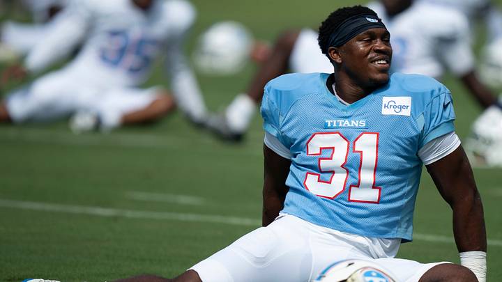 Tennessee Titans running back Kalel Mullings (31) goes through stretches during minicamp at Vanderbilt Health Football Center Tuesday, Aug. 4, 2026. Tennessee Titans running back Kalel Mullings (31) goes through stretches during minicamp at Vanderbilt Health Football Center Tuesday, Aug. 4, 2026.