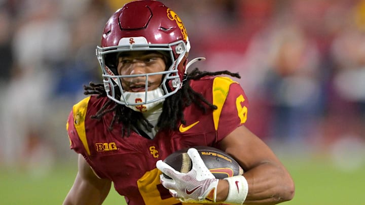 USC Trojans wide receiver Makai Lemon takes the ball on a kickoff return in the second half against the Michigan Wolverines.