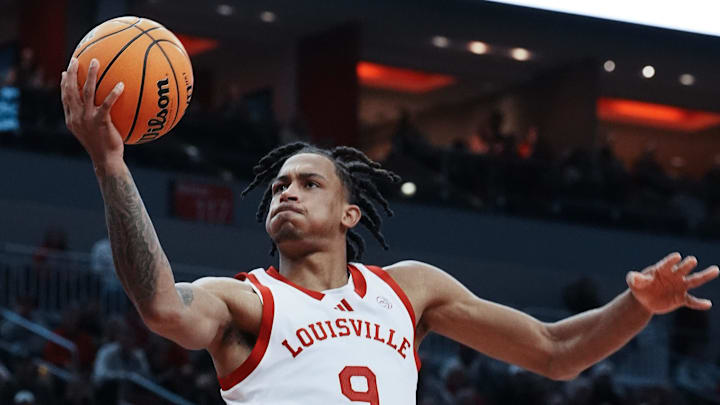 Louisville's Khani Rooths (9) shoots against Duke during their game at the KFC Yum! Center in Louisville, Ky. on Dec. 8, 2024.