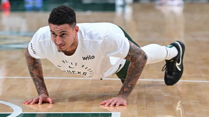 Milwaukee Bucks forward Kyle Kuzma does pushups before game against the New Orleans Pelicans at Fiserv Forum on April 10.