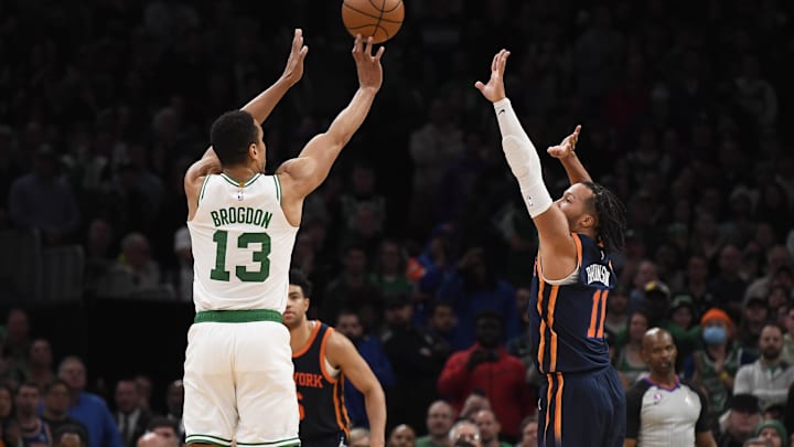 Jan 26, 2023; Boston, Massachusetts, USA; Boston Celtics guard Malcolm Brogdon (13) shoots the ball over New York Knicks guard Jalen Brunson (11) during overtime at TD Garden. Mandatory Credit: Bob DeChiara-Imagn Images Jan 26, 2023; Boston, Massachusetts, USA; Boston Celtics guard Malcolm Brogdon (13) shoots the ball over New York Knicks guard Jalen Brunson (11) during overtime at TD Garden. Mandatory Credit: Bob DeChiara-Imagn Images