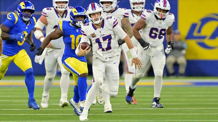 Buffalo Bills quarterback Josh Allen (17) rushes for a first down during the fourth quarter against the Los Angeles Rams at SoFi Stadium Buffalo Bills quarterback Josh Allen (17) rushes for a first down during the fourth quarter against the Los Angeles Rams at SoFi Stadium