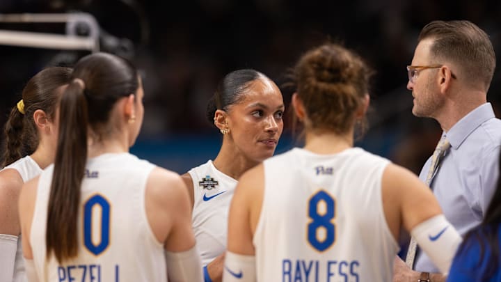 Dec 18, 2025; Kansas City, MO, USA;  Pittsburgh Panthers right-side hitter Olivia Babcock (5) listens to her head coach Dan Fisher in a 2025 NCAA Women’s Volleyball Championship semifinal match at T-Mobile Center. Mandatory Credit: Kylie Graham-Imagn Images