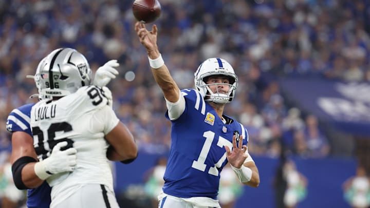 Oct 5, 2025; Indianapolis, Indiana, USA; Indianapolis Colts quarterback Daniel Jones (17) passes the ball against the Las Vegas Raiders during the first quarter at Lucas Oil Stadium. Mandatory Credit: Trevor Ruszkowski-Imagn Images