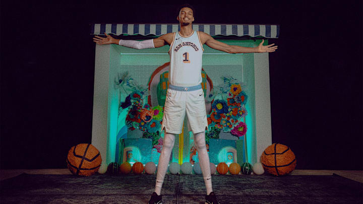 Victor Wembanyama poses in the San Antonio Spurs' new City Edition Uniforms. 