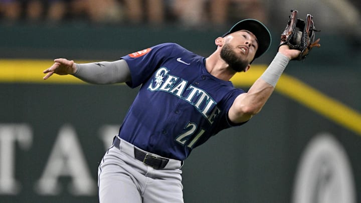 Jun 28, 2025; Arlington, Texas, USA; Seattle Mariners third baseman Miles Mastrobuoni (21) catches a pop fly hit by Texas Rangers left fielder Alejandro Osuna (not pictured) during the fourth inning at Globe Life Field. Mandatory Credit: Jerome Miron-Imagn Images