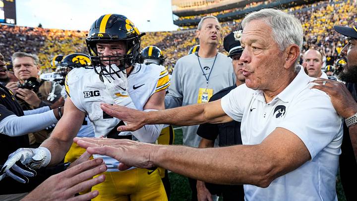 Iowa head coach Kirk Ferentz next to wide receiver Reece Vander Zee (2) get ready to handshake after 20-19 win over Michigan at Michigan Stadium in Ann Arbor on Saturday, Sept. 26, 2026.
