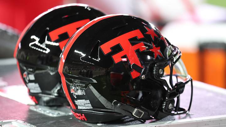 Oct 11, 2025; Lubbock, Texas, USA; A general view of Texas Tech Red Raiders helmets in the second half on the bench during the game against the Kansas Jayhawks at Jones AT&T Stadium. Mandatory Credit: Michael C. Johnson-Imagn Images Oct 11, 2025; Lubbock, Texas, USA; A general view of Texas Tech Red Raiders helmets in the second half on the bench during the game against the Kansas Jayhawks at Jones AT&T Stadium. Mandatory Credit: Michael C. Johnson-Imagn Images