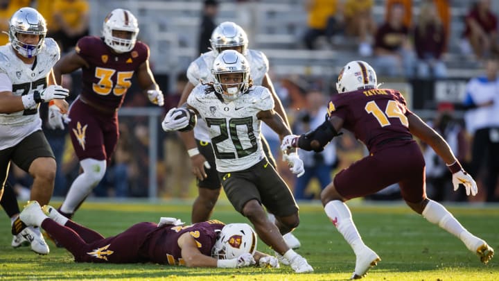 Nov 18, 2023; Tempe, Arizona, USA; Oregon Ducks running back Jordan James (20) against the Arizona State Sun Devils in the second half at Mountain America Stadium.