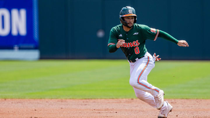 May 23, 2024; Charlotte, NC, USA; Miami (Fl) Hurricanes infielder Dorian Gonzalez Jr. (0) leads off in the second inning against the Clemson Tigers during the ACC Baseball Tournament at Truist Field. Mandatory Credit: Scott Kinser-Imagn Images