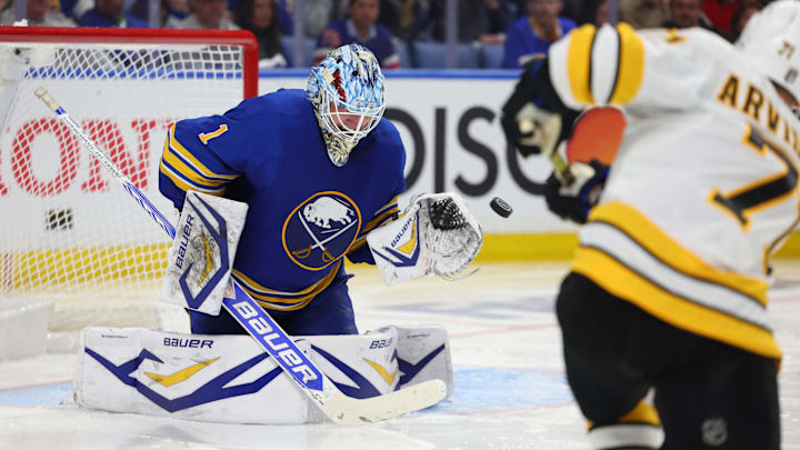 Apr 21, 2026; Buffalo, New York, USA; Boston Bruins left wing Viktor Arvidsson (71) scores a goal on Buffalo Sabres goaltender Ukko-Pekka Luukkonen (1) during the third period in game two of the first round of the 2026 Stanley Cup Playoffs at KeyBank Center. Mandatory Credit: Timothy T. Ludwig-Imagn Images