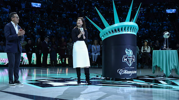 May 17, 2025; Brooklyn, New York, USA;  New York Liberty owner Clara Wu Tsai addresses the fans during the pregame ceremonies prior to the start of the game between the Las Vegas Aces and the New York Liberty at Barclays Center. Mandatory Credit: Wendell Cruz-Imagn Images