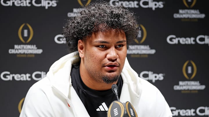 Jan 17, 2026; Miami Gardens, FL, USA; Miami Hurricanes offensive lineman Francis Mauigoa (61)talks to the media during media day for the 2025 College Football Playoff National Championship at Miami Beach Convention Center. Mandatory Credit: Nathan Ray Seebeck-Imagn Images Jan 17, 2026; Miami Gardens, FL, USA; Miami Hurricanes offensive lineman Francis Mauigoa (61)talks to the media during media day for the 2025 College Football Playoff National Championship at Miami Beach Convention Center. Mandatory Credit: Nathan Ray Seebeck-Imagn Images