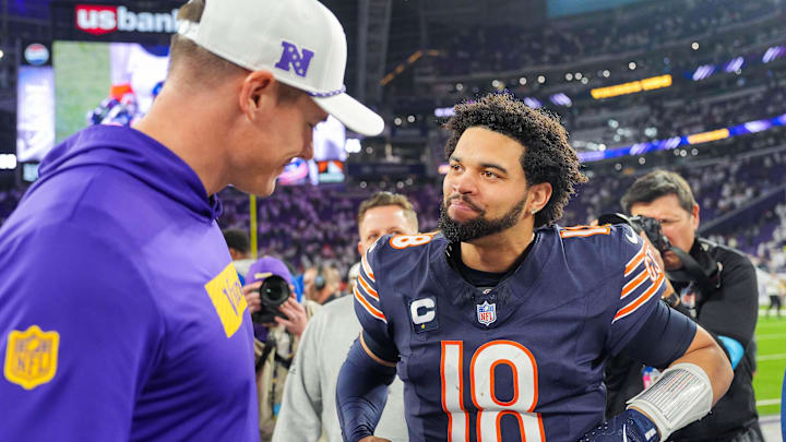 Caleb Williams gets some encouragement from Vikings coach Kevin O'Connell after the 30-12 Bears loss.