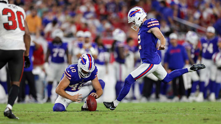 Aug 23, 2025; Tampa, Florida, USA; Buffalo Bills place kicker Tyler Bass (2) attempts a field goal held by Buffalo Bills punter Brad Robbins (40) against the Tampa Bay Buccaneers in the fourth quarter at Raymond James Stadium.