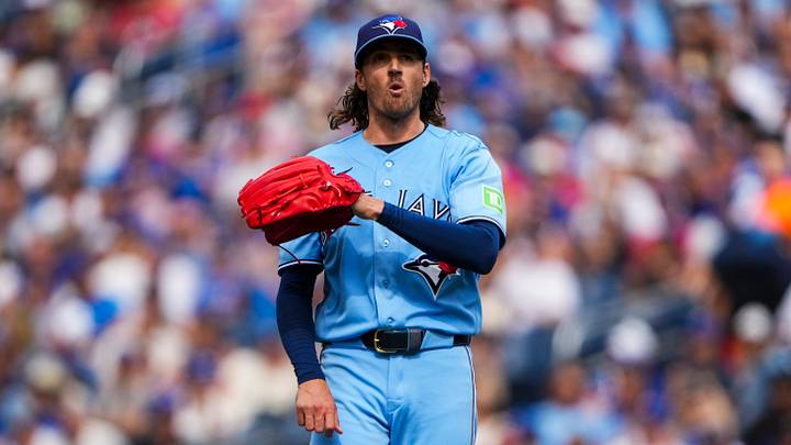 Toronto Blue Jays pitcher Kevin Gausman celebrates after throwing a strike.