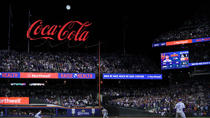 Oct 18, 2024; New York City, New York, USA; General view as the moon rises over Citi Field during the eighth inning of game five of the NLCS between the New York Mets and the Los Angeles Dodgers during the 2024 MLB playoffs at Citi Field. Mandatory Credit: Brad Penner-Imagn Images