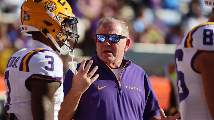 Nov 16, 2024; Gainesville, Florida, USA;LSU Tigers head coach Brian Kelly gestures prior to the game against the Florida Gators at Ben Hill Griffin Stadium. Mandatory Credit: Kim Klement Neitzel-Imagn Images Nov 16, 2024; Gainesville, Florida, USA;LSU Tigers head coach Brian Kelly gestures prior to the game against the Florida Gators at Ben Hill Griffin Stadium. Mandatory Credit: Kim Klement Neitzel-Imagn Images