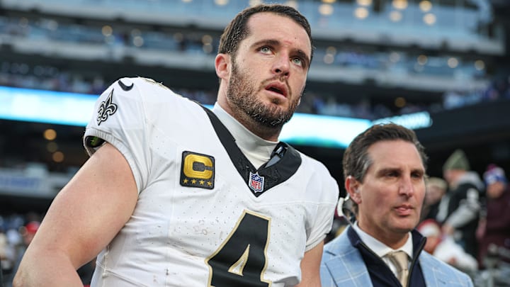 Dec 8, 2024; East Rutherford, New Jersey, USA; New Orleans Saints quarterback Derek Carr (4) walks off the field after field after an injury during the fourth quarter at MetLife Stadium. Mandatory Credit: Vincent Carchietta-Imagn Images