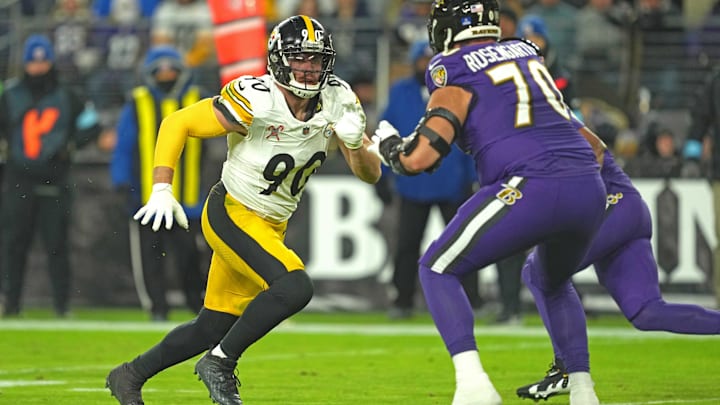 Dec 21, 2024; Baltimore, Maryland, USA; Pittsburgh Steelers linebacker T.J. Watt (90) rushes in the second quarter against Baltimore Ravens tackle Roger Rosengarten (70) at M&T Bank Stadium. Mandatory Credit: Mitch Stringer-Imagn Images