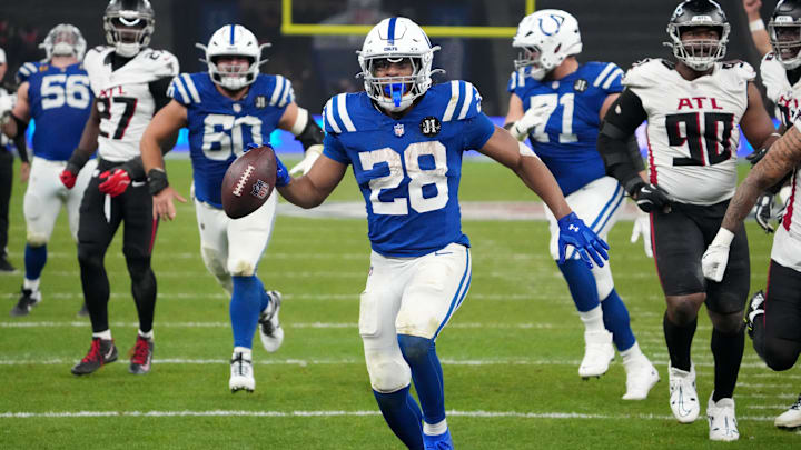 Nov 9, 2025; Berlin, Germany; Indianapolis Colts running back Jonathan Taylor (28) scores the winning touchdown in overtime against the Atlanta Falcons during the NFL Berlin Game at Olympic Stadium. 