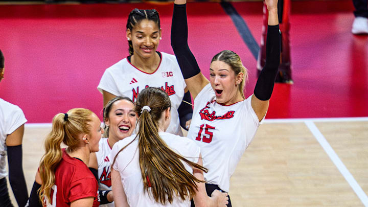The Huskers celebrate a tip from Bergen Reilly in Wednesday's win over Michigan