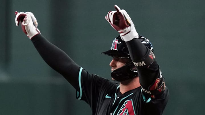 Jul 27, 2024; Phoenix, Arizona, USA; Arizona Diamondbacks first base Christian Walker (53) celebrates an RBI single against the Pittsburgh Pirates during the first inning at Chase Field. Mandatory Credit: Joe Camporeale-Imagn Images Jul 27, 2024; Phoenix, Arizona, USA; Arizona Diamondbacks first base Christian Walker (53) celebrates an RBI single against the Pittsburgh Pirates during the first inning at Chase Field. Mandatory Credit: Joe Camporeale-Imagn Images