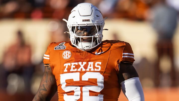 Dec 21, 2024; Austin, Texas, USA; Texas Longhorns offensive lineman DJ Campbell (52) against the Clemson Tigers during the CFP National playoff first round at Darrell K Royal-Texas Memorial Stadium. Mandatory Credit: Mark J. Rebilas-Imagn Images