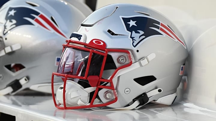 Aug 19, 2022; Foxborough, Massachusetts, USA; A Patriots helmet sits on the bench before the first half of a preseason game against the Carolina Panthers at Gillette Stadium. Mandatory Credit: Eric Canha-Imagn Images Aug 19, 2022; Foxborough, Massachusetts, USA; A Patriots helmet sits on the bench before the first half of a preseason game against the Carolina Panthers at Gillette Stadium. Mandatory Credit: Eric Canha-Imagn Images