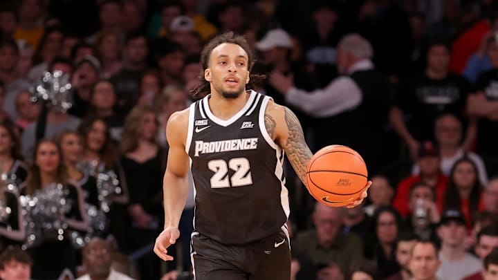 Mar 15, 2024; New York City, NY, USA; Providence Friars guard Devin Carter (22) brings the ball up court against the Marquette Golden Eagles during the first half at Madison Square Garden. Mandatory Credit: Brad Penner-Imagn Images