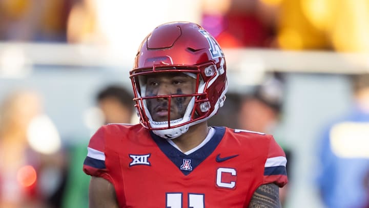 Nov 30, 2024; Tucson, Arizona, USA; Arizona Wildcats quarterback Noah Fifita (11) against the Arizona State Sun Devils during the Territorial Cup at Arizona Stadium. Mandatory Credit: Mark J. Rebilas-Imagn Images Nov 30, 2024; Tucson, Arizona, USA; Arizona Wildcats quarterback Noah Fifita (11) against the Arizona State Sun Devils during the Territorial Cup at Arizona Stadium. Mandatory Credit: Mark J. Rebilas-Imagn Images
