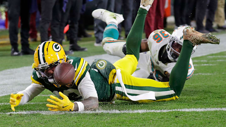Green Bay Packers wide receiver Dontayvion Wicks comes up short on a diving attempt for a touchdown against Miami Dolphins.
