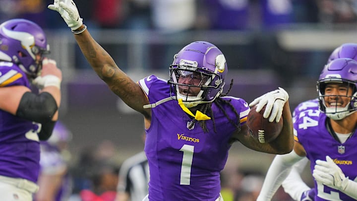 Dec 1, 2024; Minneapolis, Minnesota, USA; Minnesota Vikings cornerback Shaquill Griffin (1) celebrates his interception against the Arizona Cardinals in the fourth quarter at U.S. Bank Stadium.