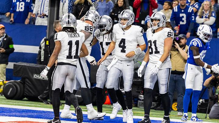 Dec 31, 2023; Indianapolis, Indiana, USA; Las Vegas Raiders wide receiver Davante Adams (17) celebrates his touchdown with teammates in the second half against the Indianapolis Colts at Lucas Oil Stadium. Mandatory Credit: Trevor Ruszkowski-USA TODAY Sports Dec 31, 2023; Indianapolis, Indiana, USA; Las Vegas Raiders wide receiver Davante Adams (17) celebrates his touchdown with teammates in the second half against the Indianapolis Colts at Lucas Oil Stadium. Mandatory Credit: Trevor Ruszkowski-USA TODAY Sports