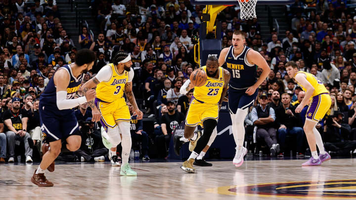 Apr 29, 2024; Denver, Colorado, USA; Los Angeles Lakers forward LeBron James (23) dribbles the ball. Apr 29, 2024; Denver, Colorado, USA; Los Angeles Lakers forward LeBron James (23) dribbles the ball.