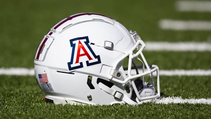 Nov 25, 2022; Tucson, Arizona, USA; Detailed view of an Arizona Wildcats helmet on the field during the Territorial Cup at Arizona Stadium. Mandatory Credit: Mark J. Rebilas-Imagn Images