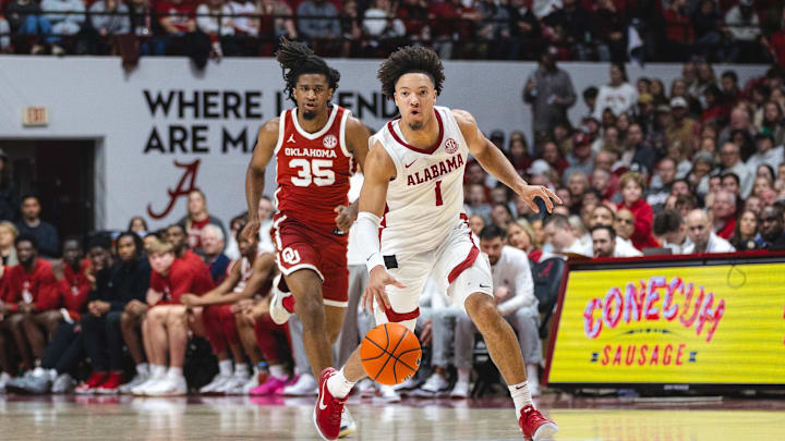 Jan 4, 2025; Tuscaloosa, Alabama, USA; Alabama Crimson Tide guard Mark Sears (1) drives the ball down the court against Oklahoma Sooners forward Glenn Taylor Jr. (35) during the second half at Coleman Coliseum. Mandatory Credit: Will McLelland-Imagn Images Jan 4, 2025; Tuscaloosa, Alabama, USA; Alabama Crimson Tide guard Mark Sears (1) drives the ball down the court against Oklahoma Sooners forward Glenn Taylor Jr. (35) during the second half at Coleman Coliseum. Mandatory Credit: Will McLelland-Imagn Images