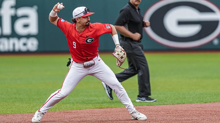 May 31, 2026; Athens, GA, USA; Georgia Bulldogs infielder Kolby Branch (9) fields a ground ball against the Liberty Flames at Foley Field. Mandatory Credit: Dale Zanine-Imagn Images