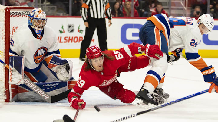 Dec 14, 2021; Detroit, Michigan, USA; Detroit Red Wings left wing Tyler Bertuzzi (59) falls down