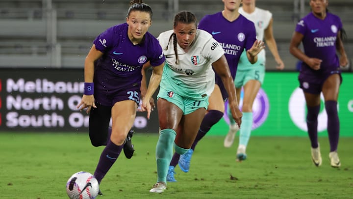 Sep 13, 2024; Orlando, Florida, USA;  Orlando Pride defender Kerry Abello (25)  dribbles the ball during the second half against the Kansas City Current at Inter&Co Stadium. Mandatory Credit: Mike Watters-Imagn Images