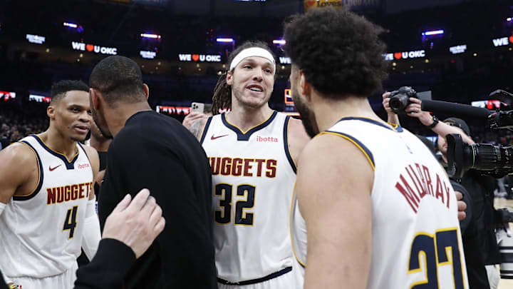 May 5, 2025; Oklahoma City, Oklahoma, USA; Denver Nuggets forward Aaron Gordon (32) celebrates with guard Jamal Murray (27) after scoring the winning basket against the Oklahoma City Thunder during game one of the second round for the 2025 NBA Playoffs at Paycom Center. Mandatory Credit: Alonzo Adams-Imagn Images May 5, 2025; Oklahoma City, Oklahoma, USA; Denver Nuggets forward Aaron Gordon (32) celebrates with guard Jamal Murray (27) after scoring the winning basket against the Oklahoma City Thunder during game one of the second round for the 2025 NBA Playoffs at Paycom Center. Mandatory Credit: Alonzo Adams-Imagn Images