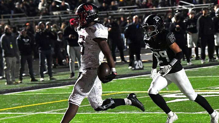 Kenyon Norman picks up his second touchdown of the night for Lakota West at the Lakota East vs. Lakota West Greater Miami Conference football game, Oct. 24, 2025.
