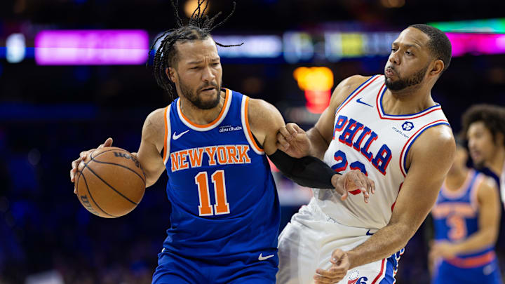 Jan 15, 2025; Philadelphia, Pennsylvania, USA; New York Knicks guard Jalen Brunson (11) drives against Philadelphia 76ers guard Eric Gordon (23) during the first quarter at Wells Fargo Center. Mandatory Credit: Bill Streicher-Imagn Images Jan 15, 2025; Philadelphia, Pennsylvania, USA; New York Knicks guard Jalen Brunson (11) drives against Philadelphia 76ers guard Eric Gordon (23) during the first quarter at Wells Fargo Center. Mandatory Credit: Bill Streicher-Imagn Images