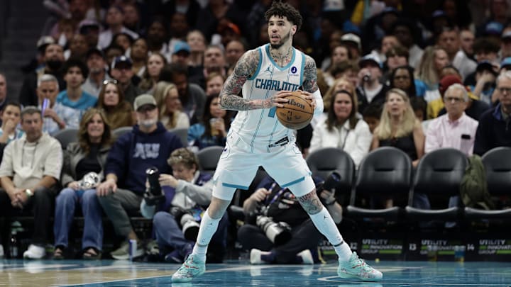 Mar 28, 2026; Charlotte, North Carolina, USA; Charlotte Hornets guard LaMelo Ball (1) controls the ball during the third quarter against the Philadelphia 76ers at Spectrum Center. Mandatory Credit: Brian Westerholt-Imagn Images