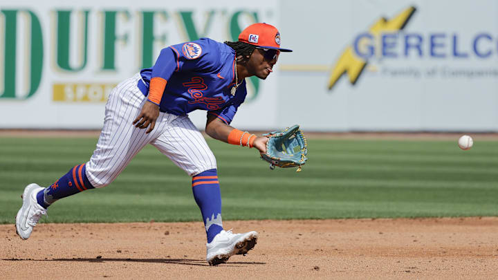 Feb 23, 2025; Port St. Lucie, Florida, USA;  New York Mets shortstop Luisangel Acuna (2) fields a ground ball during the third inning against the Miami Marlins at Clover Park. Mandatory Credit: Reinhold Matay-Imagn Images